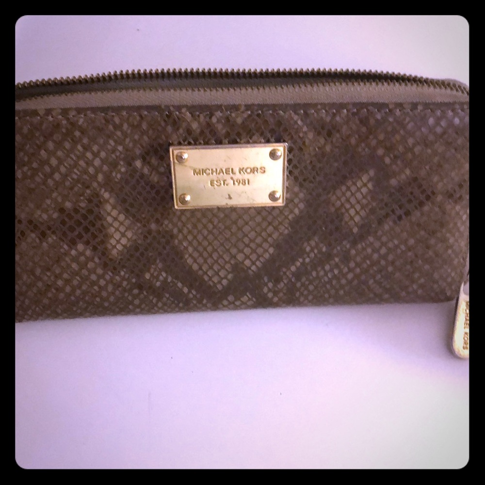 MK snake skin print wallet.